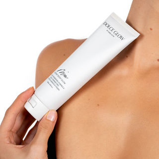 Dolce Glow Mia Instant Body Glow_Model holding product to skin