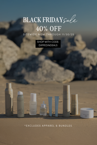Image of Dolce Glow products on the beach. Black Friday Sale 40% off site wide shop with code DIPPEDINDEALS now through 11/30/25 excludes apparel and bundles