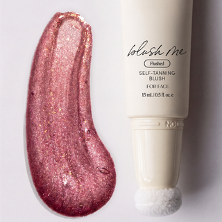 Blush Me Flushed self tanning blush wand open tube next to a sample swatch of blush.