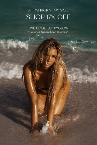 Woman on a beach with text overlay for St. Patrick's Day sale, shop 17% off with code LUCKYGLOW. excludes apparel and bundles