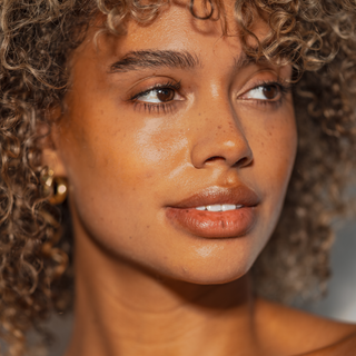 
  
    Dolce Glow-Model showcasing blended contour makeup.
  
