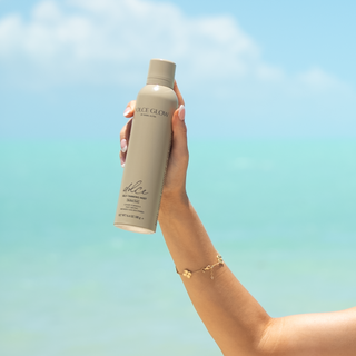 Model holding Dolce Glow Can