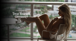ENTER TO WIN THE Treat Yourself Giveaway. Woman in a white bikini sits in a white chair by a large window.